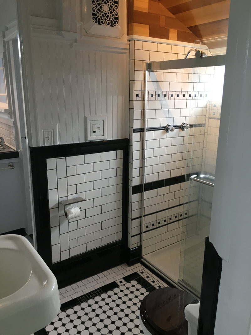Bathroom renovation - Tile work, Vintage fixtures, Cedar ceiling, Trim work, Shower door, Cabinetry