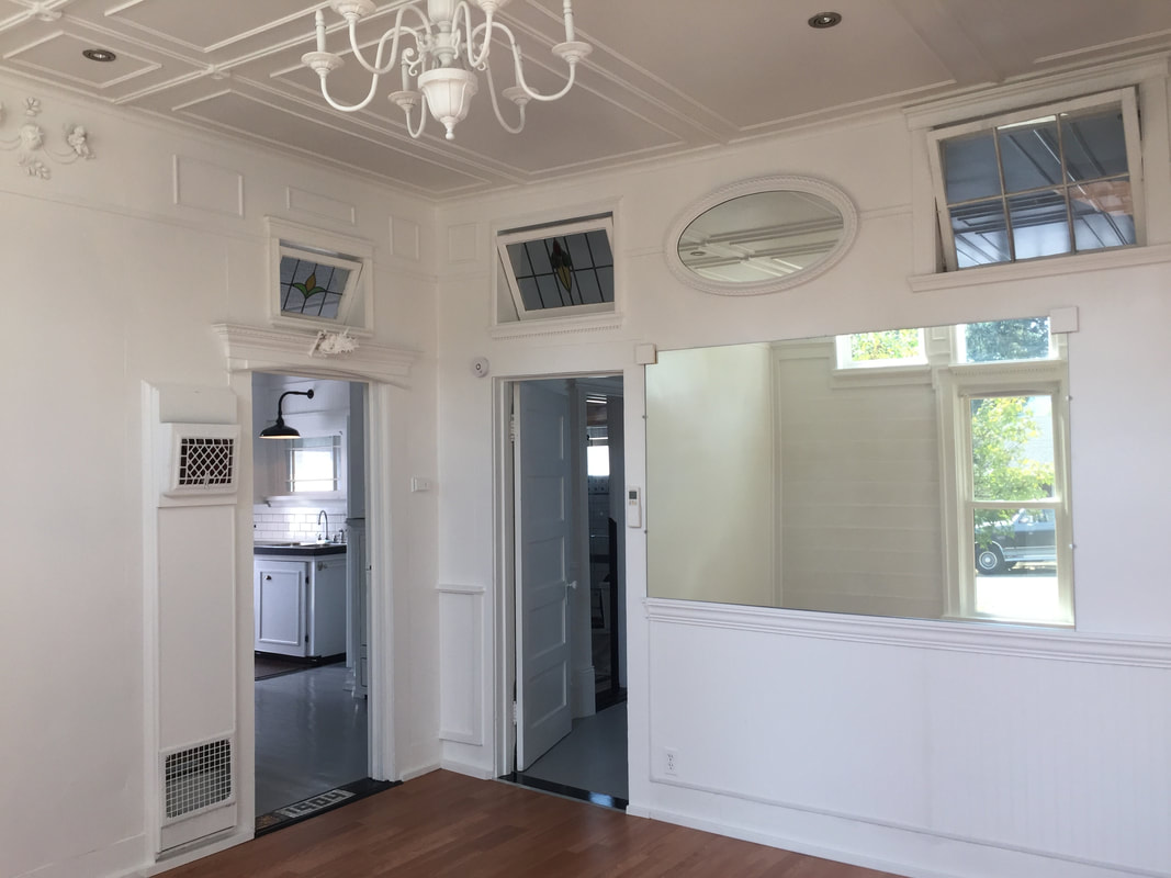 Custom Ceiling, door and wall trim, repurposed stain glass windows